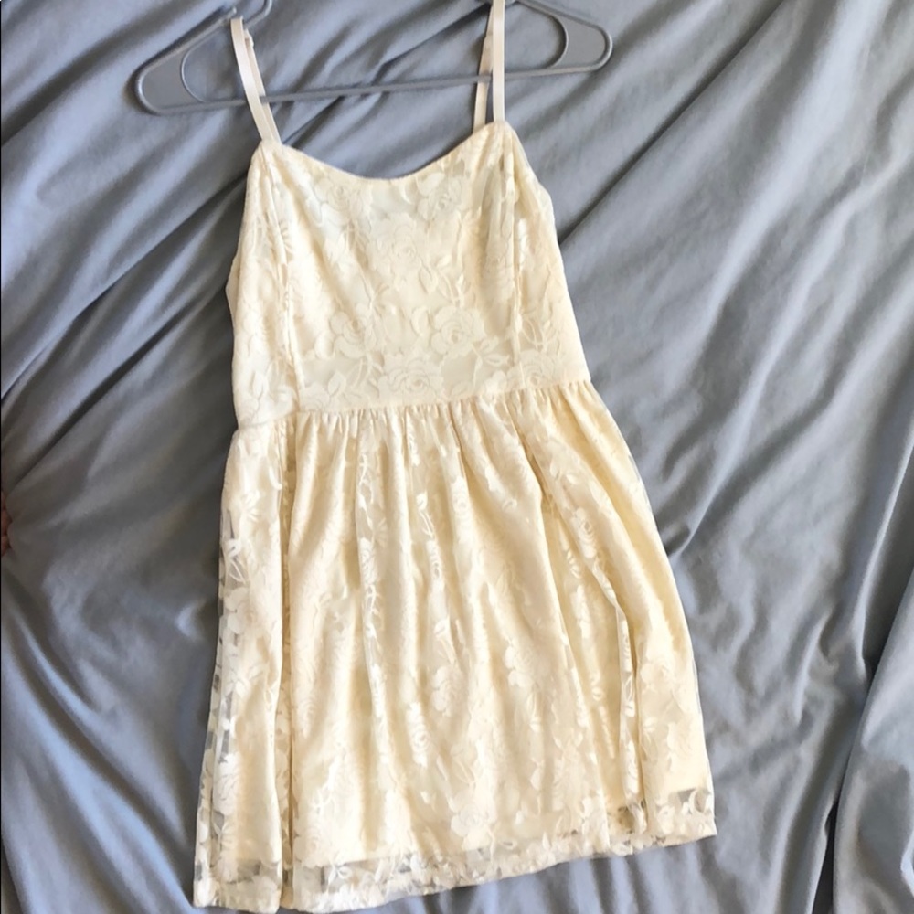 Cream colored lace baby doll dress